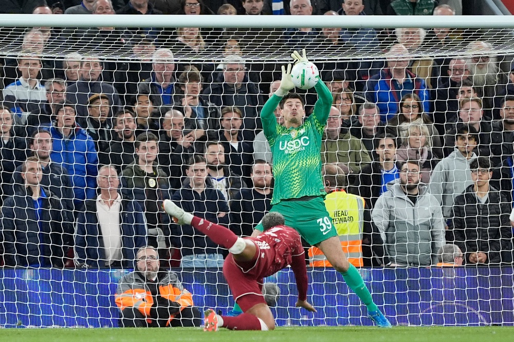 Chelsea goalkeeper Mike Penders had a fine game including denying Ryan Gravenberch during the penalty shootout (PA)