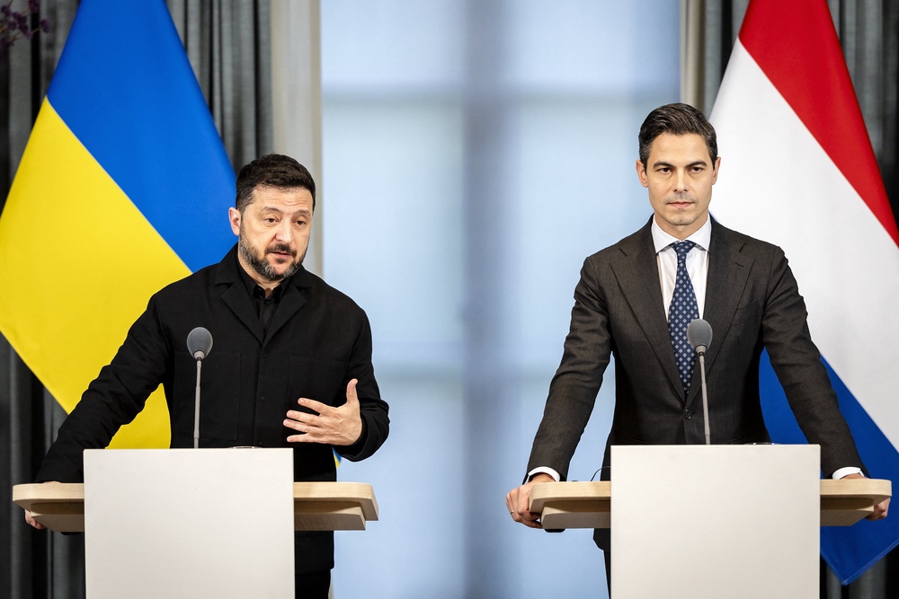 Netherlands' Prime Minister Rob Jetten (R) and Ukraine's President Volodymyr Zelensky attend a press briefing at the Catshuis following a bilateral meeting in the Hague (AFP/Getty)