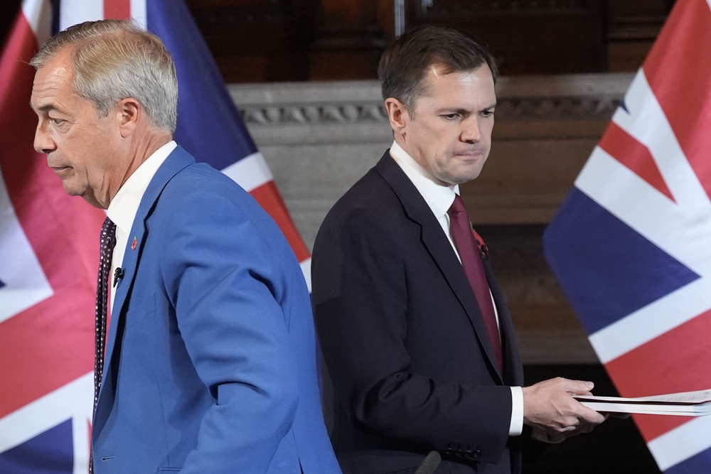 Reform UK leader Nigel Farage, left, says he feared a physical altercation at parliament (PA Wire)