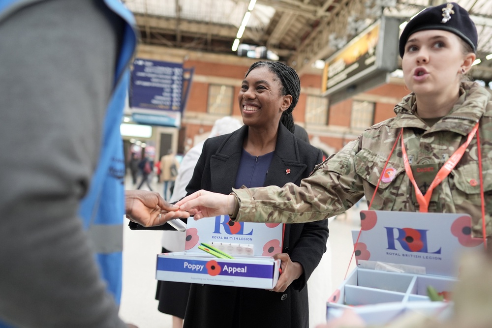 Conservative Party leader Kemi Badenoch helped sell poppies at Victoria Station in central London on Thursday (Stefan Rousseau/PA) (PA Wire)