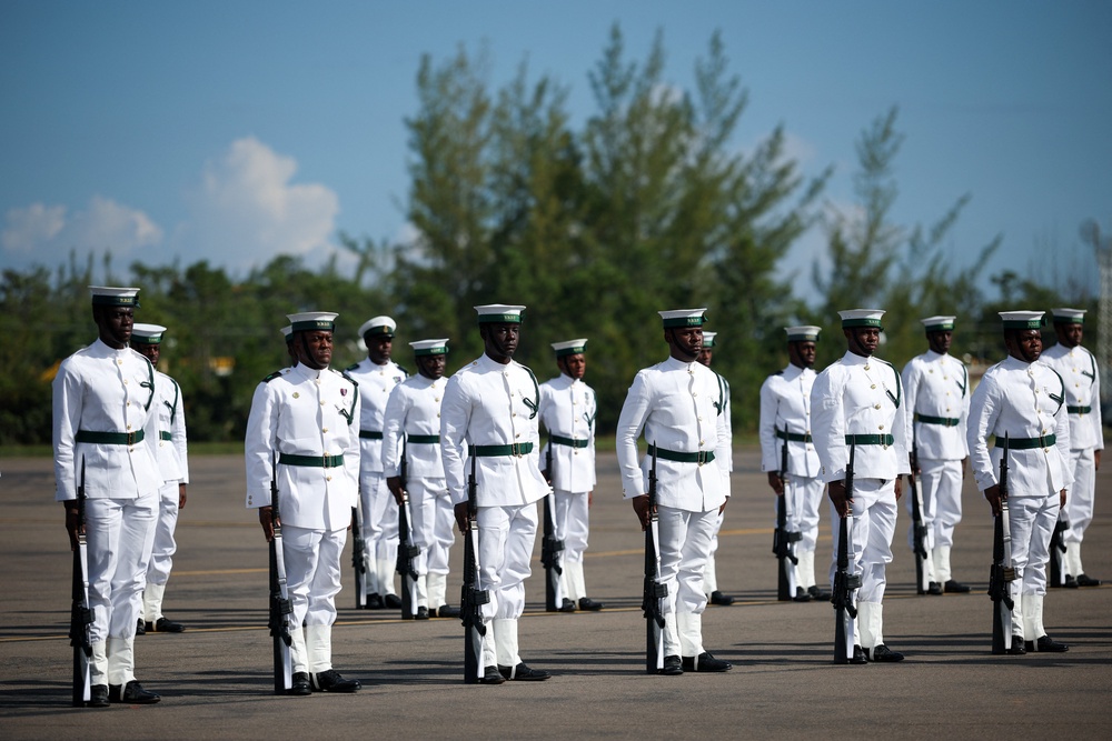 Members of the Bahamas’ defence force await the King as he boards a plane to Georgetown, Guyana (Isabel Infantes/PA) (PA Wire)