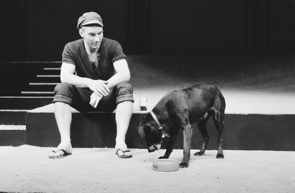 Patrick Stewart as Launce, with his dog Crab, during rehearsals for a Royal Shakespeare Company production of 'Two Gentlemen Of Verona' in 1970 (Getty)
