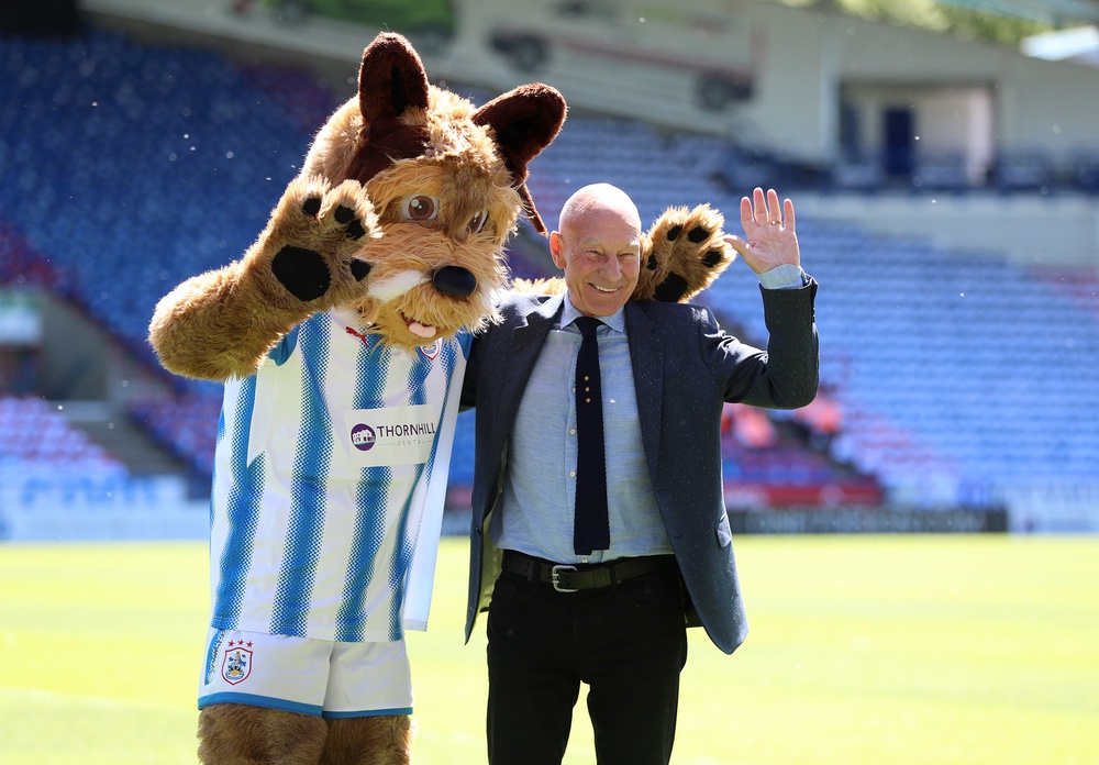 Sir Patrick Stewart with Huddersfield Town mascot Terry the Terrier (Mike Egerton/PA) (PA Archive)