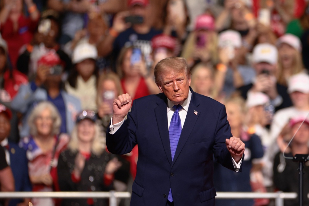 Trump dances during a campaign rally at Rock Hill Sports and Event Center (AP)