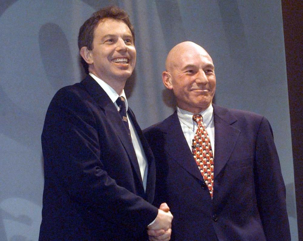 Labour leader Tony Blair meets actor Patrick Stewart, who played the part of Captain Jean-Luc Picard, the second captain of the Starship Enterprise in Star Trek, during a Labour cabaret evening at Plymouth Guildhall in 1997 (Sean Dempsey/PA) (PA Archive)