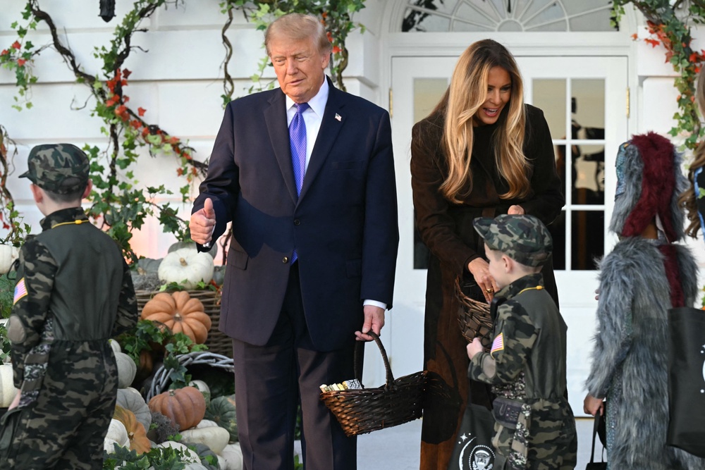 Other children dressed as soldiers and law enforcement (AFP via Getty Images)