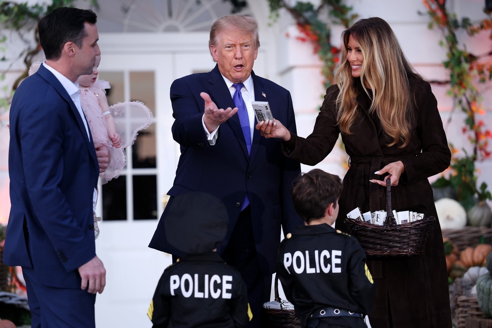 Other kids dressed as soldiers, police officers, Secret Service members, Uncle Sam and Rosie the Riveter (Getty Images)