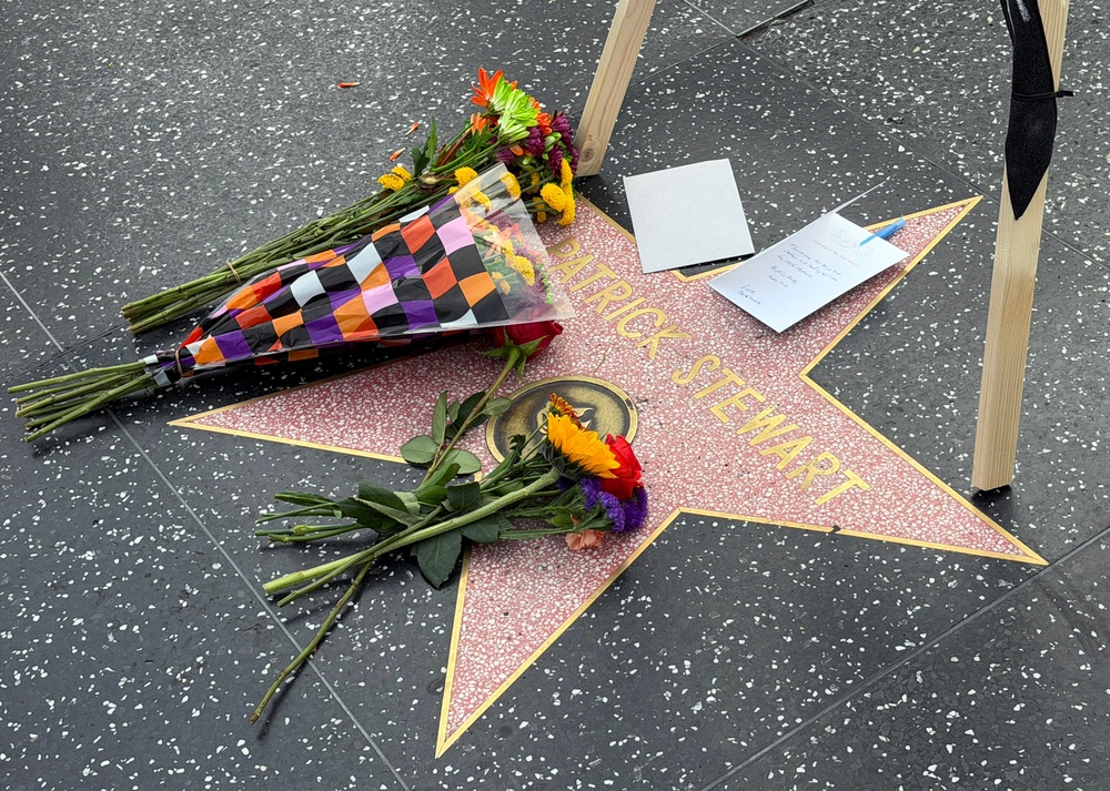 Flowers are placed on Sir Patrick Stewart's star on the Hollywood Walk of Fame after the announcement of his death, in Hollywood, California (AFP/Getty)