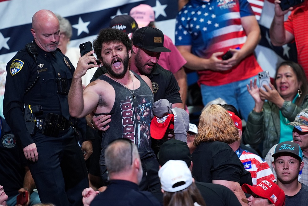 Trump's rallies are now frequently interrupted by protesters (Getty)