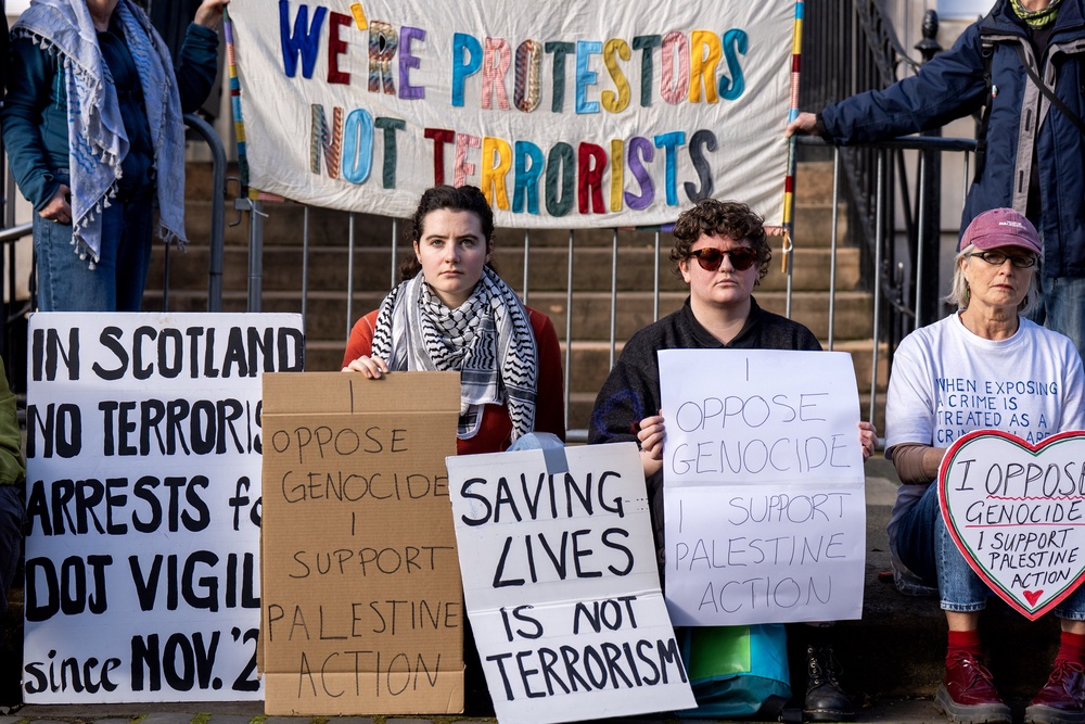 People taking part in a protest outside the US Consulate in Edinburgh (Jane Barlow/PA) (PA Wire)