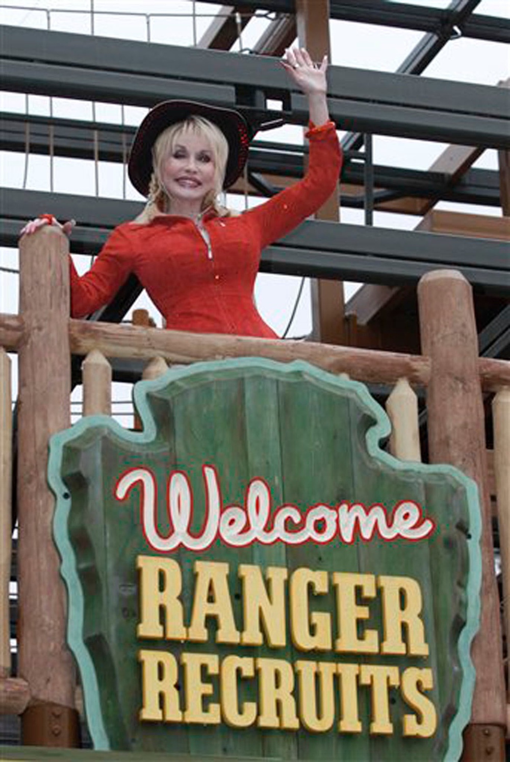 Dolly Parton, seen opening a new ride in 2010, bought an interest in a Tennessee theme park in 1986 and renamed it Dollywood (AP)