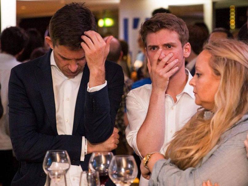 Supporters of the 'Stronger In' Campaign react to disappointing early results in the EU referendum (AFP)