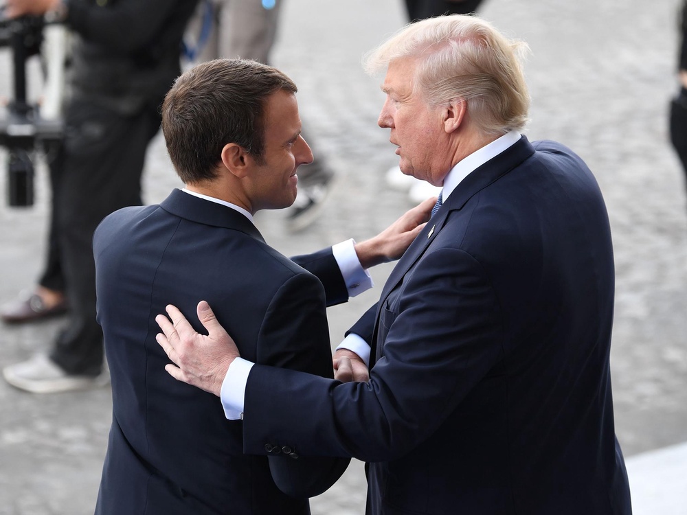 Trump and Macron once shook hands for nearly 30 seconds while attending an event in France (AFP/Getty Images)