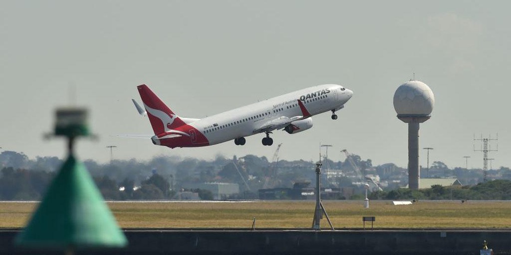 This photo taken on 23 August 2017 shows a Qantas plane taking off from Sydney airport (PETER PARKS/AFP/Getty Images)