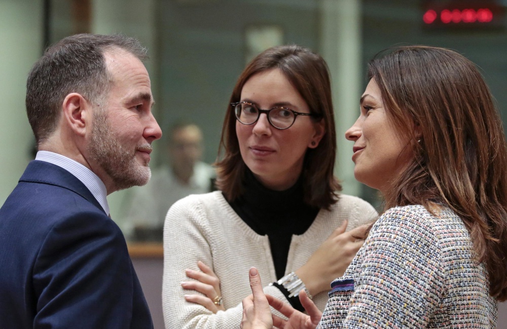 Christopher Pincher, the last UK minister to attend an EU council, talks to former minister Judit Varga (EPA)