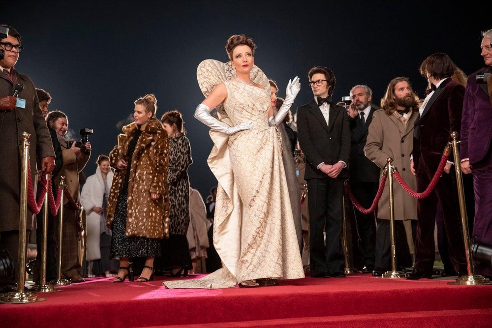 Emma Thompson as the Baroness and Andrew Leung as Jeffrey in ‘Cruella’ (Laurie Sparham/Disney)