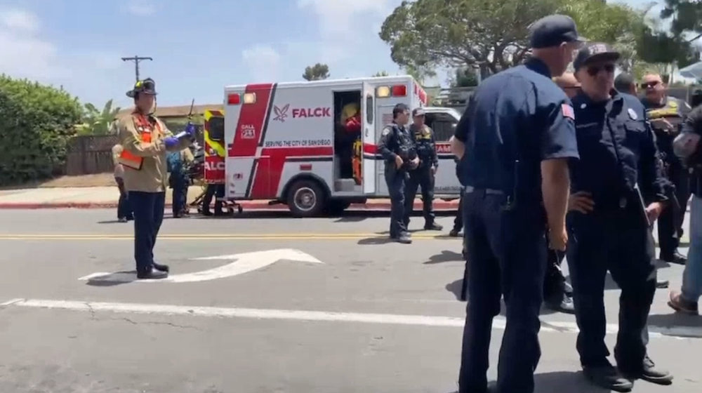 Image from: San Diego mosque shooting latest: Nazi symbol found at scene after three killed in suspected hate crime