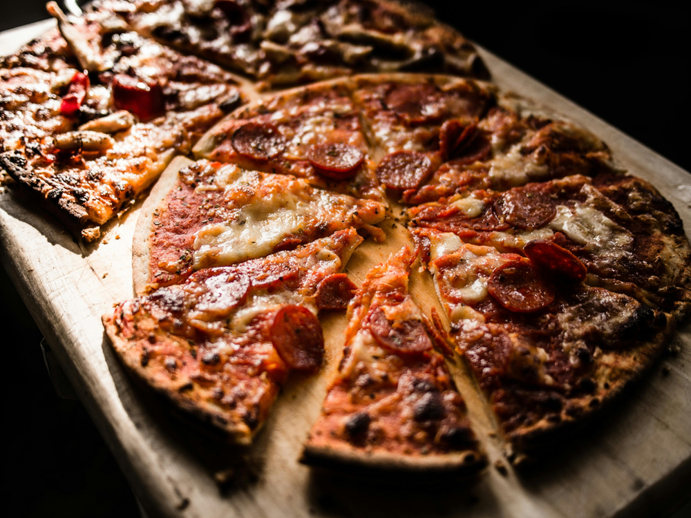 pizza cut into slices to illustrate fractional shares