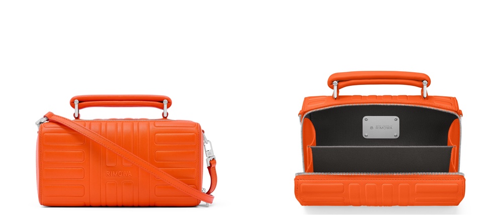 Image from: RIMOWA Welcomes Orange and Magenta, Two New Vivid Hues to Its Essential & Groove Ranges