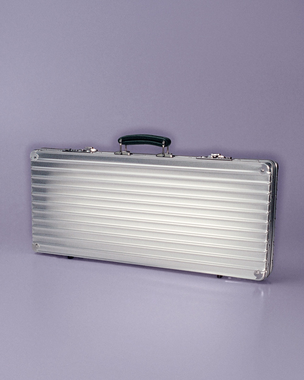 Image from: RIMOWA Just Turned Its Iconic Suitcase Into an Artist’s Dream Kit