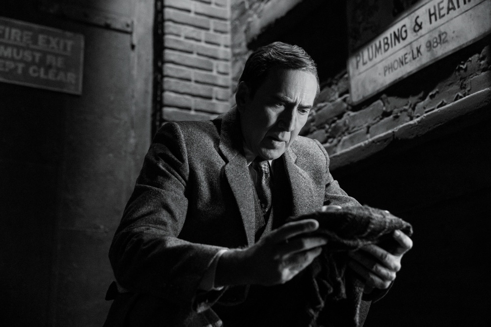 Cage brings a strange, pulpy charm to Ben, a worn-down private eye pulled back into life as the Spider.
