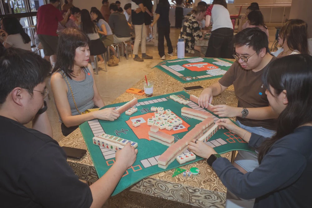 Weekly sessions help newcomers learn mahjong at their own pace.