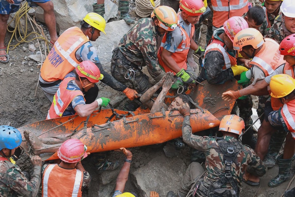 Nepal tunnel rescue boosts hopes 10 days after flood