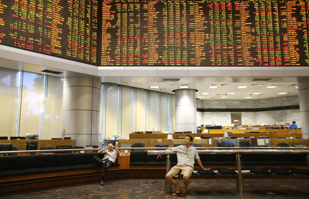 Bursa Malaysia lower at lunch break
