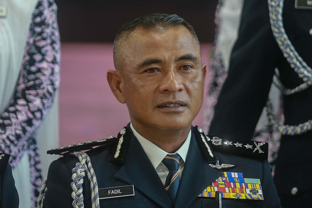 Datuk ‘Blade’ sworn in as KL police chief, pledges all-out effort to ...