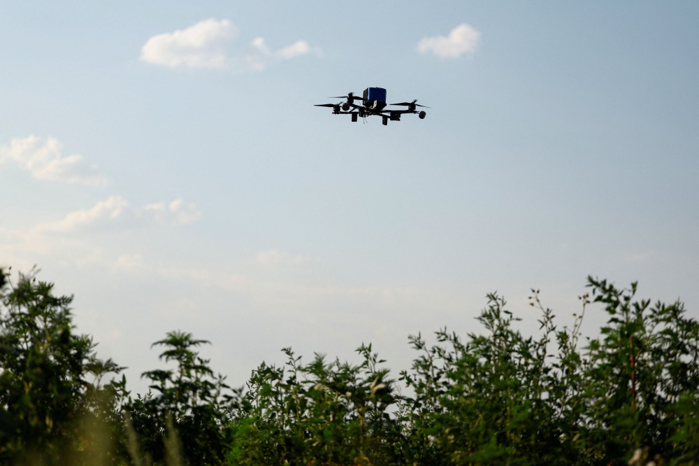 Two Chinese nationals charged with spying after flying drone near KL ...