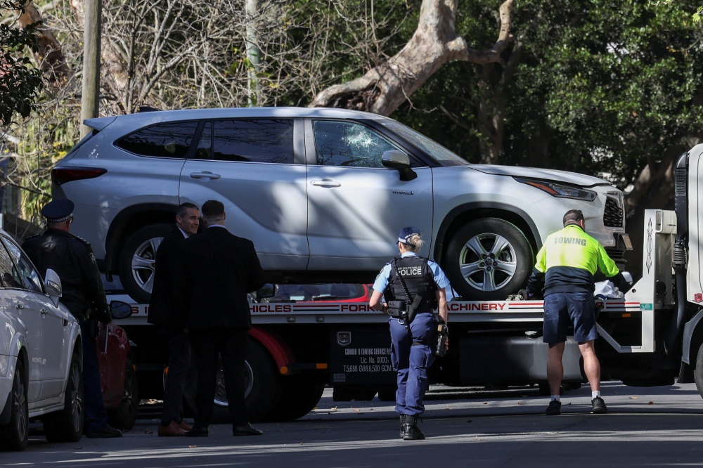 Man arrested after ramming car into Russian consulate gates in Sydney