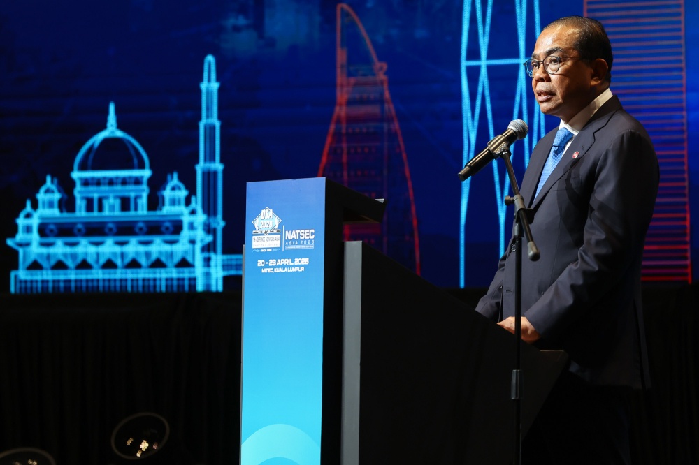 Defence Minister Datuk Seri Mohamed Khaled Nordin delivers his opening remarks at the Putrajaya Forum 2026 at MITEC in Kuala Lumpur on April 21, 2026. — Picture by Yusof Isa