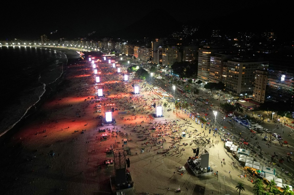 This aerial view shows fans gathering as DJ Vintage Culture performs ahead of the concert of Colombian singer Shakira, at Copacabana beach in Rio de Janeiro May 2, 2026. — AFP pic 