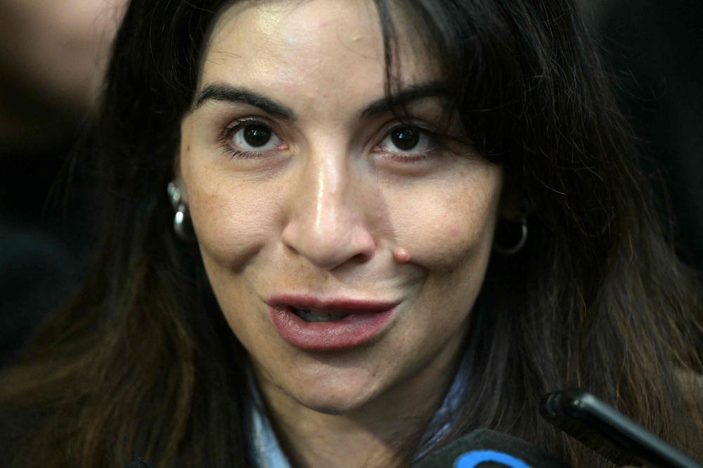 This file picture shows Gianinna Maradona speaking to the media outside court during a trial hearing on her father’s death in San Isidro, Buenos Aires province, Argentina, April 21, 2026. — AFP pic