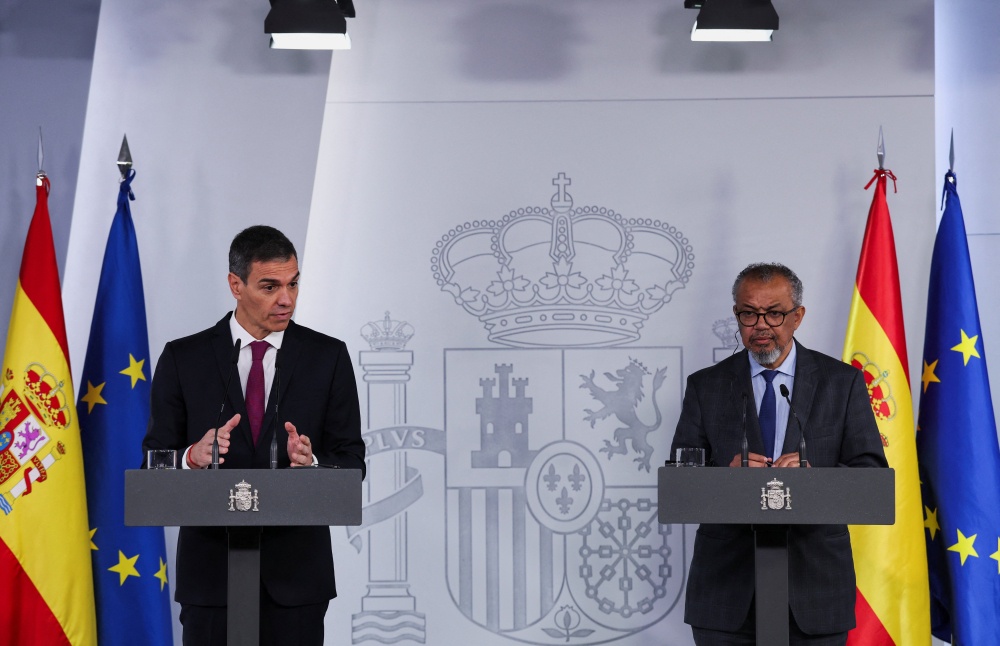 Spanish Prime Minister Pedro Sanchez and World Health Organization (WHO) Director-General Tedros Adhanom Ghebreyesus hold a joint press conference at Moncloa Palace in Madrid, Spain on May 12, 2026. — Reuters pic