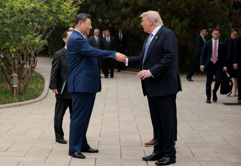 US President Donald Trump shakes hands with Chinese President Xi Jinping as he departs from the Zhongnanhai Garden in Beijing on May 15, 2026. — Reuters pic