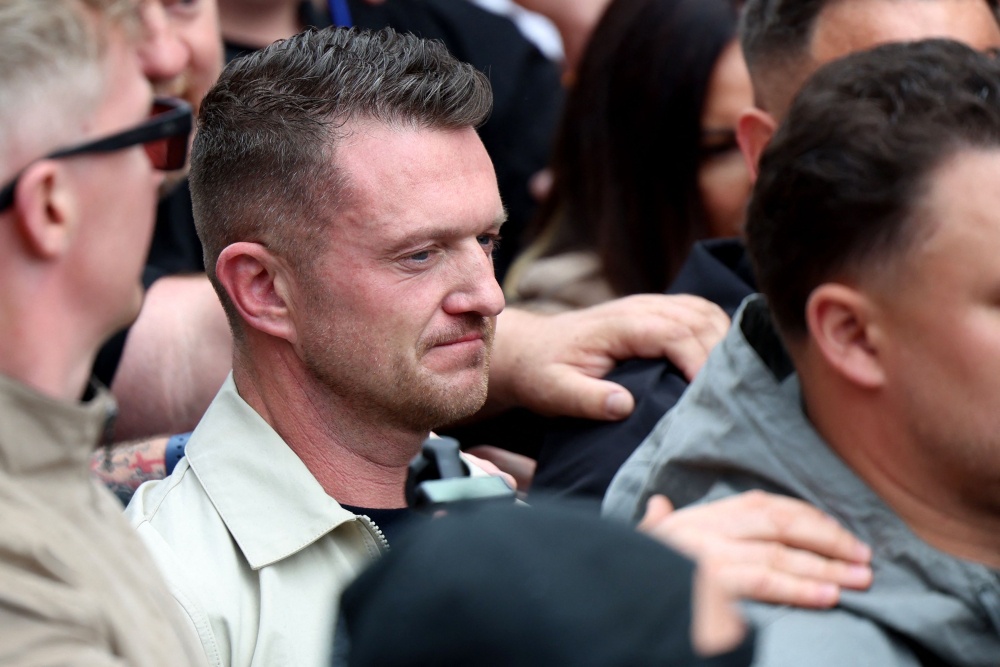 British far-right activist Tommy Robinson, real name Stephen Yaxley-Lennon, looks on during a rally organised by United The Kingdom, in central London on May 16, 2026. — AFP pic