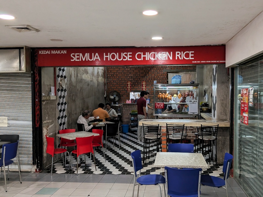 Unlike the rest of the eateries in Pertama Complex, Semua House Chicken Rice is located on the second floor, among phone and clothing shops. — Picture by Ethan Lau