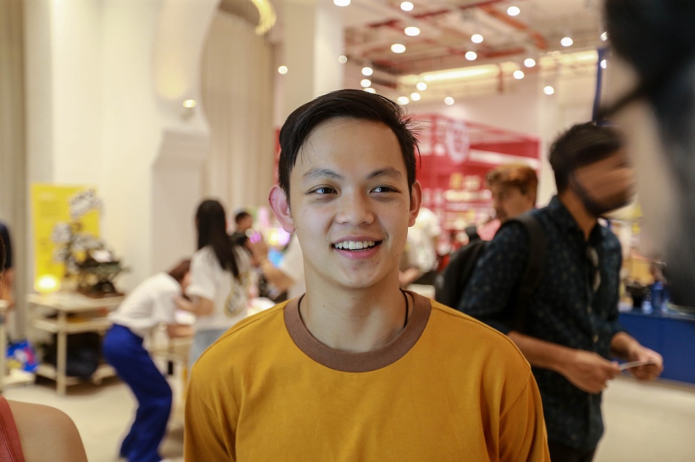 Visitor Neoh Wei Shen speaks to Malay Mail at the newly renovated Old General Post Office on Jalan Raja, Kuala Lumpur, May 23, 2026. — Picture by Sayuti Zainudin