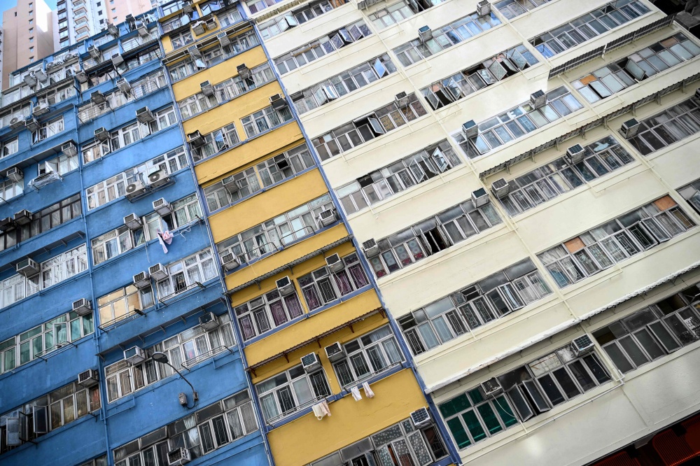 This photo taken on May 21, 2026 shows the Yee Wa Building in Cheung Sha Wan, where subdivided housing units are home to people in Kowloon, Hong Kong. — AFP pic