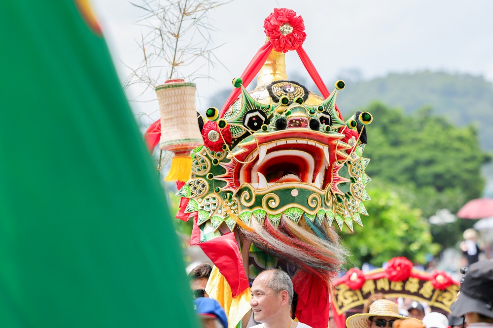 A ‘qilin’, with two persons operating its head and body, is seen here during the Piu Sik Parade at Cheung Chau, Hong Kong. — Picture courtesy of Hong Kong Tourism Board
