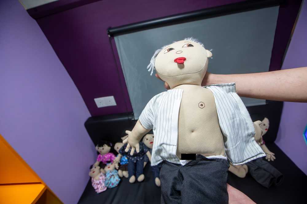 The anatomical dolls feature facial characteristics, including a retractable tongue, as well as limbs, clothing and anatomically accurate body proportions, including genitalia. — Picture by Raymond Manuel