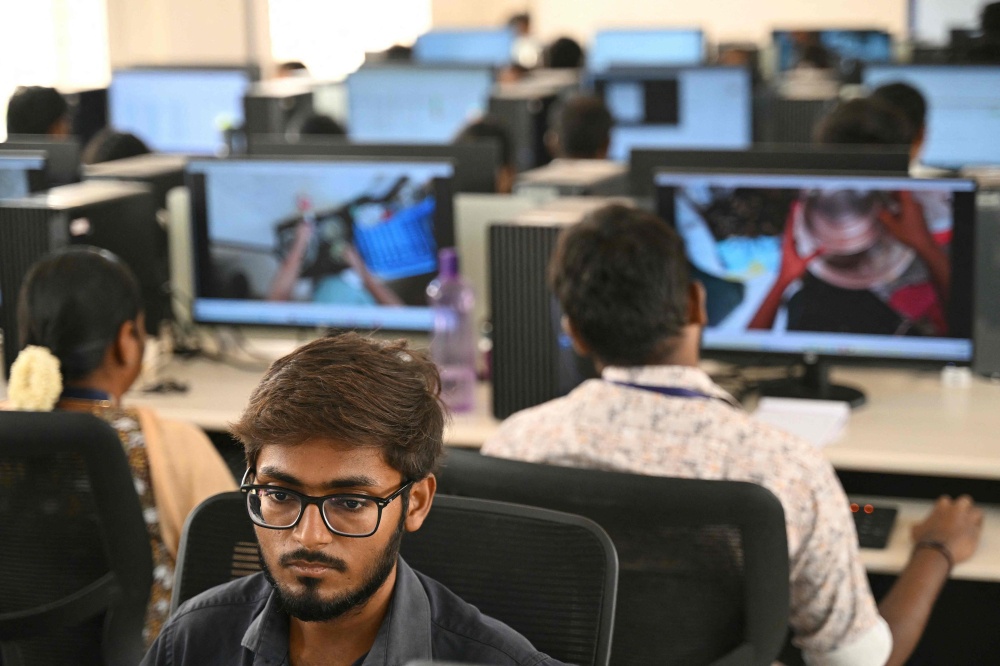 Developers think feeding first-person footage, called ‘egocentric data’, into specialised AI models will help robots copy humans. The humanoid robot market is booming, with investment bank Morgan Stanley predicting there could be over a billion in use by 2050, mostly for industrial and commercial purposes. In India, the emerging field of spatial AI is providing new employment — for now. — AFP pic 