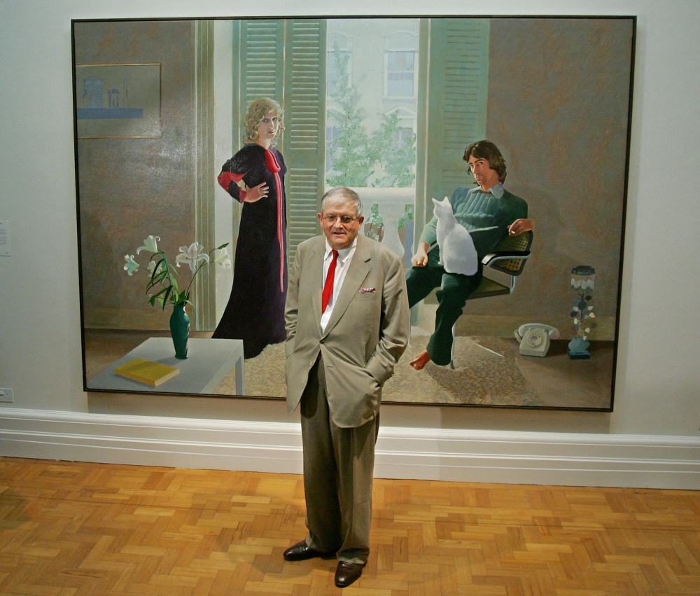 British artist David Hockney poses in front of his painting entitled ‘Mr and Mrs Clark and Percy’ (1970) at the National Portrait Gallery in London, 11 October 2006. — AFP pic