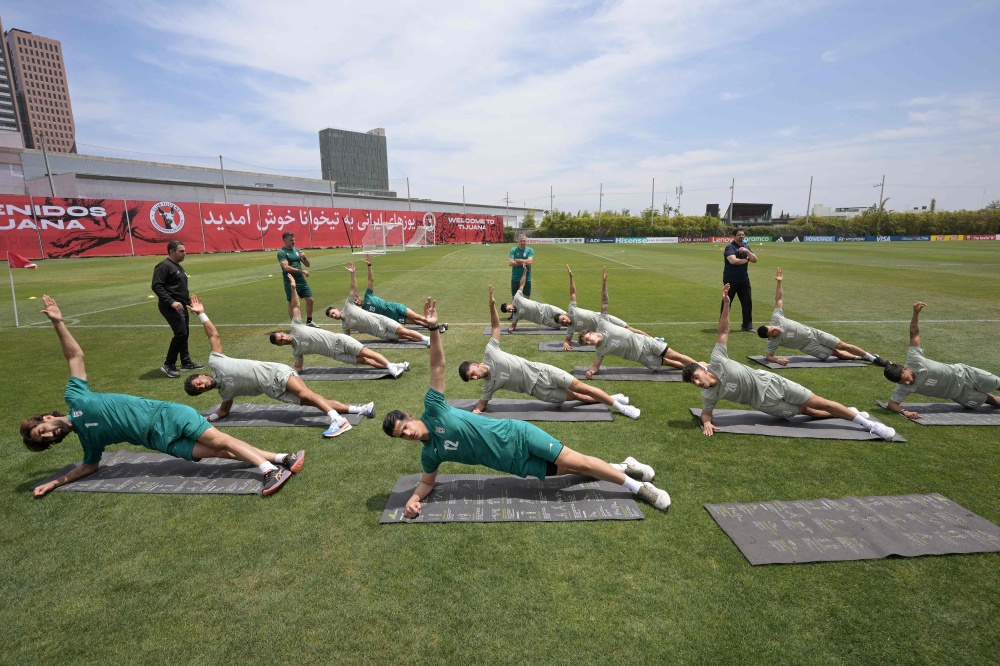Iran’s players take part in a training session during the 2026 World Cup football tournament at the Centro Xoloitzcuintle in Tijuana, Mexico, near a parking lot where a body was found. —  AFP pic