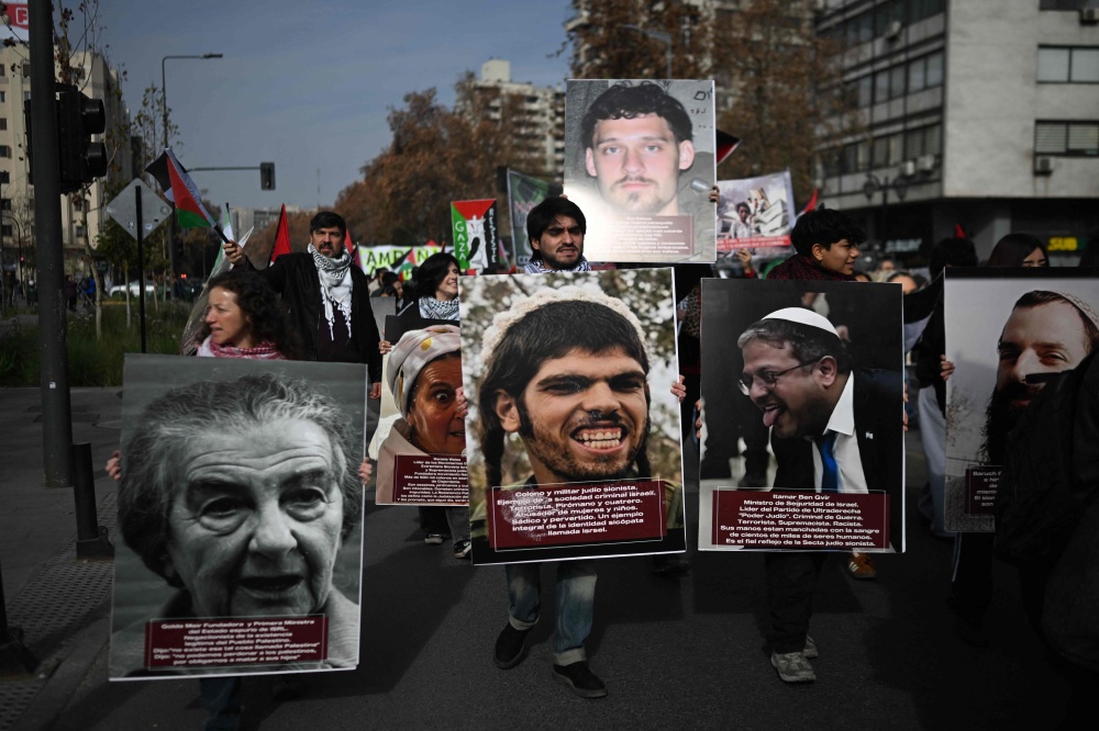 Members of the Palestinian community in Chile protest against Israeli attacks on Lebanon in Santiago on June 20, 2026. — AFP pic
