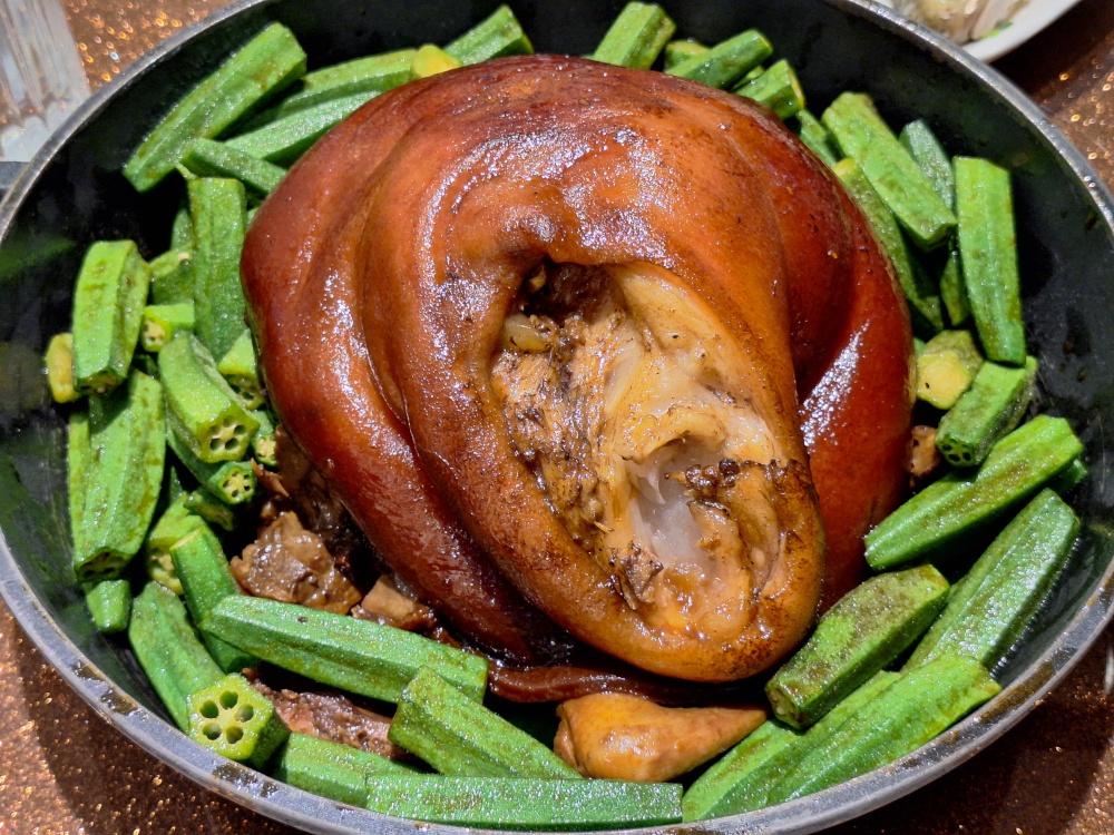 Braised pork knuckle with baby pigeon, said to be the Qing dynasty’s Qianlong Emperor’s favourite dish, served at George Private Kitchen, Hong Kong. — Picture by Ida Lim