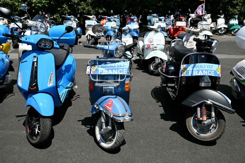 Vespa enthusiasts from around the world gather at the Vespa Village in Rome during the Vespa World Days to mark the 80th anniversary of the iconic Italian scooter brand on June 25, 2026. — AFP pic