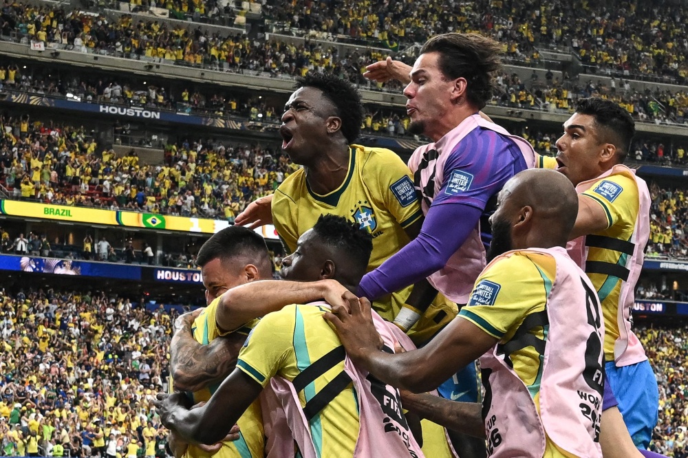 Brazil’s players celebrate their second goal during the 2026 World Cup round of 32 football match between Brazil and Japan in Houston June 29, 2026. — AFP pic