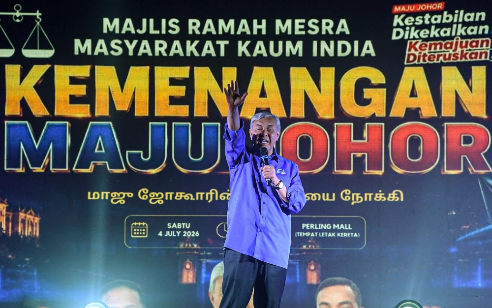 Deputy Prime Minister and Barisan Nasional chairman Datuk Seri Dr Ahmad Zahid Hamidi delivers a speech during a gathering with the Indian community at Perling Mall in Johor Bahru on July 2, 2026. — Bernama pic